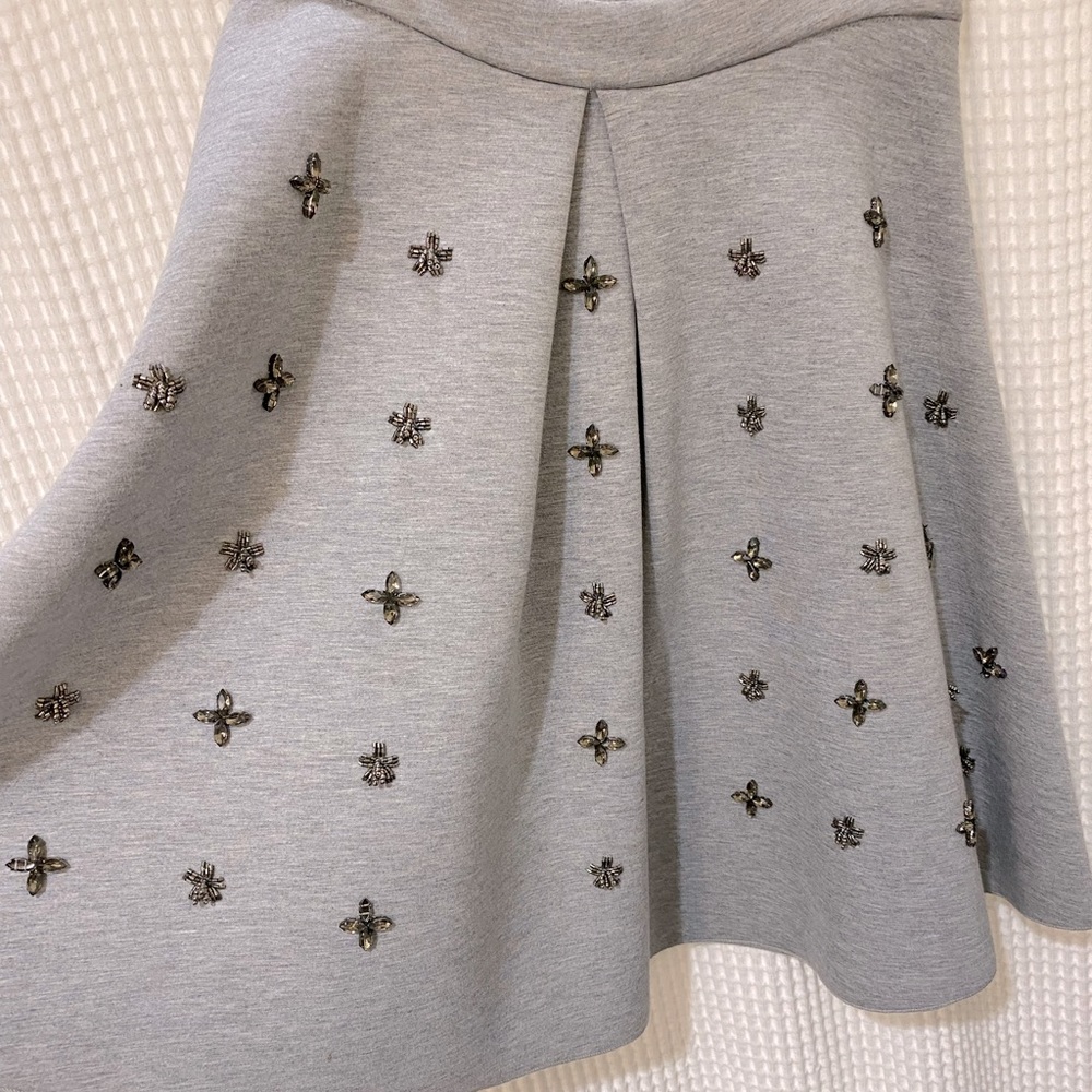 Flirty scuba skirt with beading